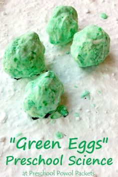 four green eggs sitting on top of snow covered ground with the words, green eggs preschool science