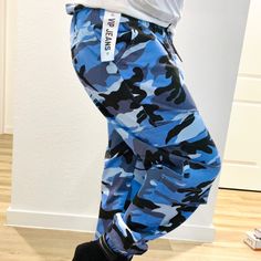 Stylish Blue Camo Pants! Cute Cute Cute! So Nice Had To Say It Three Times! Size: 15/16 (Can Also Fit Smaller) Cargo Like Pant With 2 Front Pockets And 4 Faux Side Pockets. Draw String Waist. Elastic Cuff Hemline. Vip Jeans Camo Pocket Pants Brings Style And Fashion Together. Comfy Pull On Perfomance Stretch Like Jeans. Perfect Casual Or Stand Out At An Event. Great Choice For All Sizes. Top Quality Premium Long Lasting Denim Cotton Blend. * Machine Wash * Active Fit Casual Camo Pull On Pants Wi Trendy Blue Straight Leg Sweatpants, Trendy Blue Joggers With Elastic Waistband, Blue Cargo Pants For Loungewear, Relaxed Fit Blue Cargo Pants For Loungewear, Blue Relaxed Fit Cargo Pants For Loungewear, Trendy Blue Sweatpants With Pockets, Blue Camo Cargo Pants, Blue Camo Pants, Sheen Dress