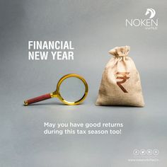 a magnifying glass sitting next to a bag with the word financial new year written on it