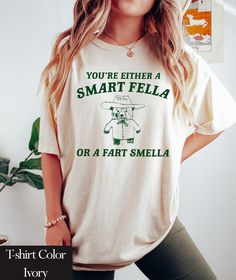 Smart Fella or Fart Smella Retro Cartoon T-Shirt - Funny Quirky Unisex - Trash Panda Meme Design - Comfort Colors Comfort Colors introduces its garment-dyed t-shirt; a fully customizable tee made 100% with ring-spun cotton. The soft-washed, garment-dyed fabric brings extra coziness to your wardrobe while the relaxed fit makes it an excellent daily choice. The double-needle stitching throughout the tee makes it highly durable while the lack of side-seams helps the shirt retain its tubular shape. Panda Meme, Retro Cartoon, Cartoon T Shirt, Trash Panda, Meme Design, Frog T Shirts, Retro Cartoons, Cartoon T Shirts, Funny Tees