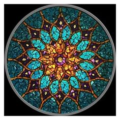 a circular stained glass window with blue and yellow colors