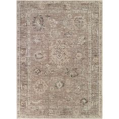 an antique style rug with various colors and patterns on the carpet, including beiges and browns