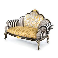 an ornately decorated chair with black and white stripes