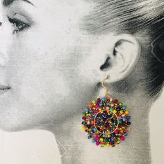 Confetti Splash seed bead Earrings Big bold super bright multicolored earrings. Fun and fabulous extra large disk earrings created with various shades and finishes of seed beads. Over 600 individually sewn beads are woven to make these beautiful earrings. The post earwires and findings are 14kt gold plated. These large, bold, statement earrings measure approximately 2.5 inches (5.08 cm) total. The discs are 2 inches (6.35 cm). Great for daywear and perfect for the night out. Fun, exciting and lo Disc Earrings, Big Earrings, Large Earrings, Earrings Photo, Seed Bead Earrings, 14kt Gold, Confetti, Beautiful Earrings, Statement Earrings