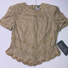 New With Tags. Size 10. Great Vintage Top. Elegant Embellished Beige Tops, Elegant Beige Embellished Tops, Spring Formal Beaded Tops, Elegant Beige Sequined Tops, Elegant Cream Embellished Tops, Formal Beaded Tops For Summer, Elegant Beaded Tops For Formal Occasions, Elegant Beaded Tops For Wedding, Fitted Embellished Beige Tops