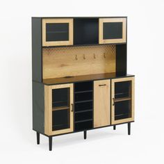 a wooden cabinet with black doors and drawers