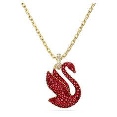 This pendant reimagines the iconic Swarovski Swan in a pavé of auspicious red crystals worn on a gold-tone plated chain. This is a truly captivating piece of jewelry to add a vibrant flourish to your style, or for giving as a special gift. Swarovski Red Jewelry, Swan Pendant, Life Affirmations, Swan Necklace, Swarovski Swan, Fashion Figure, Golden Red, Red Pendants, Swarovski Necklace