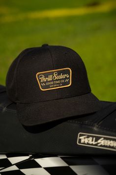 Thrill Seekers - A Good Time Company. This clean lid features our 'Billboard' patch sewn into a black 6 panel snapback hat. Features High profile, mid-deep fitting structured snapback Plastic adjustable snapback Flat Bill One Size Fits All Materials 100% Cotton Canvas Thrill Seeker, Classic Logo, Good Time, Snapback Hat, Snapback Hats, A Black, One Size Fits All, Cotton Canvas, Hats