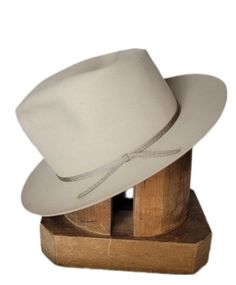 For your consideration is this beautiful open road style fedora. The high density smooth felt is a pleasure to touch. Light tan in color and comes in a raw edge. Shape it to your desired style and hit the town. Please view pictures as they are part of the description.  Manufacturer labels read, Shuddle Bros, Houston. Condition: Felt has a few light spots, but overall very clean. Sweatband still remains supple and ready to wear. Please view photos as they are part of the description.  Measurement Solid Fedora With Short Brim For Ranch, Solid Short Brim Fedora For Ranch, Beige Fedora With Short Brim For Ranch, Beige Short Brim Fedora For Ranch, Hat Blocks, Open Road, Large Size, Vintage Men, Hat Fashion