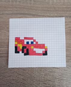 a piece of paper that has been made to look like a lego car on it