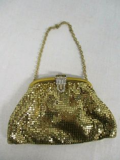 This is in very good condition, only missing one rhinestone on the clasp as shown.  This measures the chain strap 4 1/2" drop, 6 3/4" wide X 4 1/4" high.    Please look closely at my photos for details.  Item 1835 E Gold Retro Bags With Gold-tone Hardware, Retro Gold Bags With Gold-tone Hardware, Gold Retro Bags, Retro Gold Evening Bag, Antique Gold Bag For Party, Antique Gold Bags For Party, Antique Gold Party Bag, Gold Retro Evening Bag For Parties, Retro Gold Evening Bag For Parties