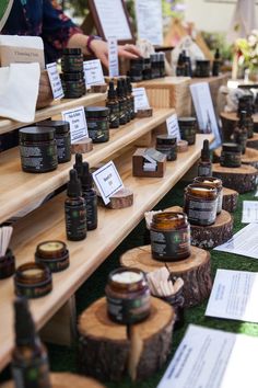 many bottles of essential oils are on display