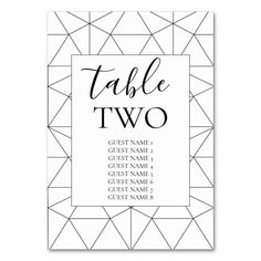 a black and white table number card with the word table two on it's front