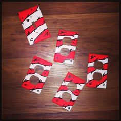 the letters are made out of red and white paper