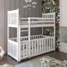 a white bunk bed sitting on top of a hard wood floor next to a rug