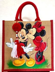 a hand painted mickey and minnie mouse bag