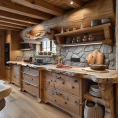 a rustic kitchen with stone and wood accents