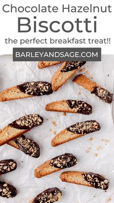 chocolate hazelnut biscotti on parchment paper with text overlay that reads, chocolate hazelnut biscotti the perfect breakfast treat