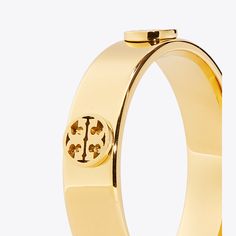 Our iconic collection, reimagined as jewelry. Perfect for stacking, the Miller Ring is dotted with Double T studs. Tory Burch Ring, Kira Chevron, Middle Finger Ring, Miller Sandal, Tory Burch Miller, Rings Cool, Ring Fit, Womens Jewelry Rings, Band Ring