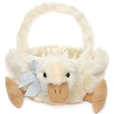 a stuffed animal in a basket on a white background