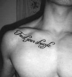 a man's chest with the words take your struggle tattooed on his left side