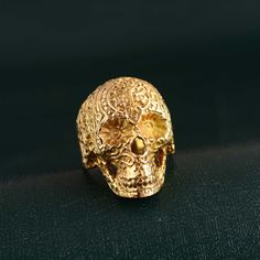 skull ring, gold skull ring, skull face ring, gothic ring, cool ring, classic ring, unique ring, vintage ring, statement ring, handmade ring Metal:- Brass ✦ Our rings are made of high-quality Brass metal and are carefully crafted by hand in our family workshop. The brass metal will develop a nice antique color over time. So, I suggest cleaning it once in a while for getting back to the shiny original color. You can use natural ingredients like lemon or vinegar with water to clean it. Also, apply a thin coat of transparent nail paint/nail enamel on the ring's inner side to save it from being tarnished. ❥ You may request to return the products, 15 days after you received the items (Delivery Day). The buyer is responsible for the shipping costs for the return. (We may have slower production a Luxury Unique Gold Skull Ring, Luxury Gold Skull Ring For Men, Luxury Gold Skull Ring As A Gift, Luxury Gold Skull Ring For Gift, Unique Luxury Gold Skull Ring, Cool Ring, Gothic Ring, Face Ring, Gold Skull