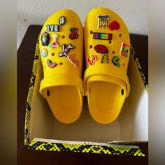 Brand New Pair Of Crocs Never Worn Comes With Croc Charms. Yellow Non-slip Casual Clogs, Yellow Slip-on Casual Clogs, Yellow Casual Non-slip Clogs, Yellow Casual Slip-on Clogs, Fun Spring Clogs, Yellow Flat Casual Mules, Casual Yellow Clogs For Beach, Casual Yellow Clogs For The Beach, Fun Summer Synthetic Clogs