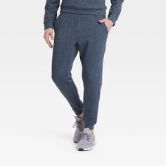 Why we're ALL IN: Mesh spacer joggers with a solid-color finish, double-knit texture, mid rise, full length and banded cuffs. Crafted from a lightweight fabric blend with stretch for comfortable wear that moves with you. Tailored in a regular-fit silhouette. Feature side pockets and a zippered back pocket for stashing go-to essentials, and a drawstring waistband for a customizable fit. All in Motion™: Inspiring the potential in every body. Winter Sports Joggers With Stretch, Winter Sports Stretch Joggers, Comfort Stretch Joggers With Ribbed Waistband And Tapered Leg, Stretch Joggers With Ribbed Cuffs, Stretch Joggers With Ribbed Cuffs For Jogging, Winter Stretch Joggers With Ribbed Waistband, Stretch Winter Joggers With Ribbed Waistband, Stretch Bottoms With Ribbed Cuffs For Jogging, Sports Joggers With Tapered Leg And Ribbed Cuffs