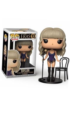 the pop vinyl figure is shown in front of a white box with an empty chair