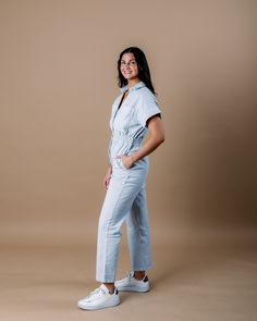 Introducing the Aspen Short Sleeve Jumpsuit, a contemporary take on classic utility wear. With its relaxed fit and short sleeves, it offers both comfort and functionality for everyday wear. The denim fabric adds a casual yet versatile touch, making it easy to dress up or down for any occasion. Whether you're running errands or meeting friends for brunch, the Aspen Short Sleeve Jumpsuit is the perfect choice for effortless style with a nod to heritage craftsmanship. Embrace the timeless appeal of