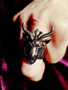 Baphomet Ring - Baphomet Goathead ring. - Silver colour. Currently only available in 4 different sizes, US size 8, 9, 10, & 11. Worldwide Shipping More jewellery, accesoires, altar equipment and much more can be found at www.luciferothica.com © Luciferothica.com All Rights Reserved. Satanic Accessories, Baphomet Jewelry, Satanic Altar, Satanic Witch, Weird Old Photos, Goat Of Mendes, Left Hand Path, Satanic Jewelry, Inverted Pentagram