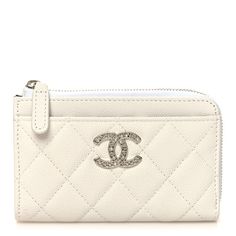 This is an authentic CHANEL Caviar Quilted CC Logo Zip Around Card Holder in White. This stylish card case is crafted of diamond-quilted caviar leather in white. The case features card slots  with a silver Chanel CC logo on the front and a matching top zipper. This opens the main compartment to a black and white fabric interior. Black And White Fabric, Overnight Bags, Chanel Caviar, Navy Fashion, Makeup Bags, Chanel Wallet, Card Holder Wallet, Cc Logo, Overnight Bag