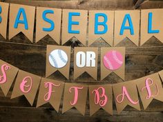 baseball or softball banner with pink and blue letters on wood planks, hanging from the ceiling