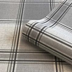 a plaid pattern is shown in grey and white