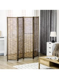 the room divider is made out of bamboo