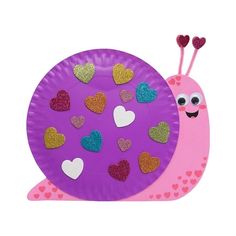 a purple paper plate with hearts and a pink snail on it's side, in front of a white background