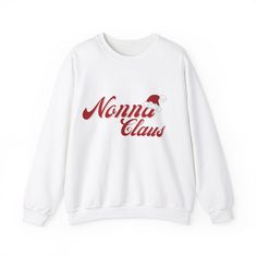 Get into the holiday spirit with this cozy Italian Christmas sweatshirt! Perfect for family gatherings and expressing your Christmas joy, this unisex crewneck sweatshirt is made with a medium-heavy fabric blend for ultimate comfort during the colder months. Its classic fit and double-needle stitching ensure durability while the tear-away label guarantees itch-free wear. Ideal for anyone celebrating Christmas with an Italian twist! Product features - Cozy medium-heavy fabric blend of cotton and polyester - Classic fit with crew neckline for comfort - Durable double-needle stitching - Ethically grown US cotton and OEKO-TEX-certified dyes - Ideal for family Christmas gatherings and expressing holiday cheer Care instructions - Machine wash: cold (max 30C or 90F) - Non-chlorine: bleach as neede Winter Long Sleeve Tops With Lettering, Crew Neck Tops With Lettering For Winter, White Letter Print Tops For Winter, White Crew Neck Top For Winter, Christmas Crew Neck Cotton Sweater, Casual Christmas Sweatshirt With Letter Print, Casual Christmas Crew Sweatshirt, Christmas Cotton Crew Neck Sweater, Casual Christmas Crew Neck Sweatshirt