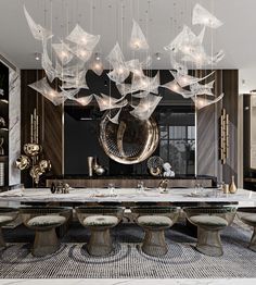 an elegant dining room with chandelier and marble table