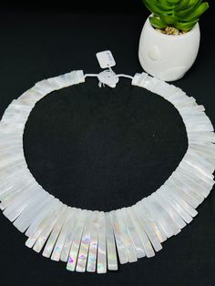 One Piece white Mother of pearl beaded necklace,  Beads Necklace. Handmade/Hand Braided Necklace Necklace length: 20.7 Inches Materials: White Mother of Pearl Adjustable length: No Can be personalized: Yes We take order work as well. Feel free to contact for purchasing goods in bulk. We are Wholesaler & manufacturers of semi-precious & precious gemstones, Loose Gemstones Beads, Cabochons. Measurements & weight are close approximations White Shell-shaped Pearl Drop Necklace, White Necklaces With Colorful Beads For Party, White Round Beads For Party, White Mother Of Pearl Round Bead Necklaces, White Pearl Jewelry With Faceted Beads, White Pearl Beaded Necklaces For Party, White Mother Of Pearl Beaded Necklace With Pearl Drop, White Pearl Drop Necklace In Mother Of Pearl, White Mother Of Pearl Necklace With Pearl Drop