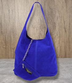 Royal blue Real Suede Leather Tote bag Cobalt Blue Slouch Bag Blue Hobo Handbag Suede Leather Shoulder bag Gifts for her Open top with magdot closure  Additional zipped purse with chain  Silver tone metal hardware  Soft Real Suede  Handle drop: 38cm  Dimensions: H60cm x W37cm x D16c Blue Large Capacity Pouch Bucket Bag, Large Capacity Blue Pouch Bucket Bag, Blue Hobo Bag For Shopping, Blue Soft Leather Hobo Bag With Double Handle, Blue Soft Leather Hobo Bag For Travel, Blue Soft Leather Bucket Bag For Everyday Use, Everyday Blue Pouch Hobo Bag, Blue Soft Leather Pouch Shoulder Bag, Blue Soft Leather Shoulder Bag