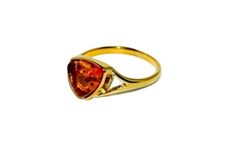 Delicate ring handcrafted with sterling silver covered 14 ct. gold and natural Baltic amber.Warm and sunny cognac amber stone fitted in gold setting.This lovely jewellery suitable for everyday and evening wear.Amber stone created by nature over 25 millions years ego, amber attracts good luck, balances emotions, dissolves negative energy. Care Instructions: To maintain your jewellery, wipe gently with a cotton cloth that is soft and clean. Do not soak in water. Avoid contact with soaps, detergent Amber Hallmarked Fine Jewelry Rings, Amber Hallmarked Rings In Fine Jewelry Style, Fine Jewelry Citrine Rings In Amber, Amber Hallmarked Promise Ring, 14k Gold Amber Rings For Gift, 14k Gold Amber Rings As Gift, Amber 14k Gold Rings For Gift, Baltic Amber Ring For Anniversary, Orange Hallmarked Ring As Gift