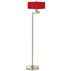 a floor lamp with a red shade on the base and a white light behind it