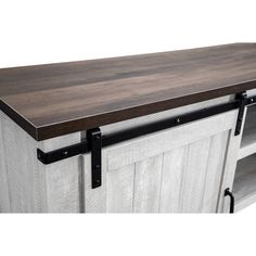 a kitchen island with sliding doors on the front and back sides, made out of wood