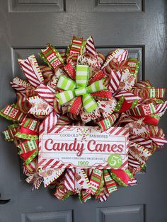 a candy cane wreath on the front door