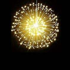 a lighted ferris wheel in the dark with lights on it's sides and stars all around