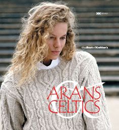 a woman wearing a sweater with the words arans celtics written in red on it