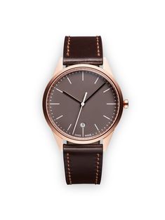 London-based watchmaker Uniform Wares is renowned for introducing contemporary British elegance to high-quality Swiss excellence. Pared-down and minimal, these luxurious timepieces are ideal for day-to-night wear. Crafted from PVD-coated rose gold stainless steel, this C36 Date dress watch from Uniform Wares features a supple brown Nappa leather strap, a classic C-line Lunette 36mm case, a Swiss-made quartz movement ETA 955.412, 7 jewels, a date indication, a scratch-resistant sapphire glass len Minimalist Formal Watch With Round Dial, Minimalist Formal Watch, Minimalist Formal Watches, Modern Rose Gold Watches With Subdials, Modern Rose Gold Watches, Minimalist Formal Watch With Subdials, Minimalist Business Watch With Subdials, Brown Minimalist Watches For Business, Brown Minimalist Watch For Business