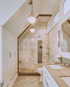 a bathroom with two sinks and a shower in the corner on the right side of the room