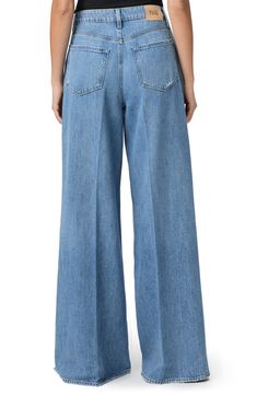 Made from supersoft and drapey denim, these vintage-inspired jeans feature the brand's highest waist and widest, longest legs to create a dramatic silhouette. 34 1/2" inseam; 28 1/2" leg opening; 12" front rise Zip fly with button closure Five-pocket style 60% cotton, 40% lyocell Machine wash, tumble dry Imported Medium Wash Wide Leg Flare Jeans With Belt Loops, Classic Wide-leg Denim Bottoms, Classic Mid-rise Wide Leg Denim Pants, Classic Denim Wide Leg Pants For Spring, Spring Wide Leg Flare Jeans With Belt Loops, Spring Flare Jeans With Belt Loops, Spring Wide-leg Flare Jeans With Belt Loops, Classic Wide Leg Jeans For Spring, Spring Flare Full-length Jeans With Belt Loops