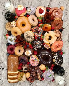 there are many different donuts on the table